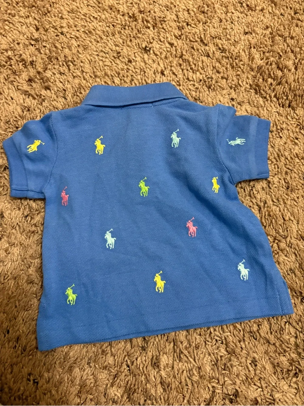 Like new Polo Ralph Lauren light blue polo shirt with colourful logo embroidery